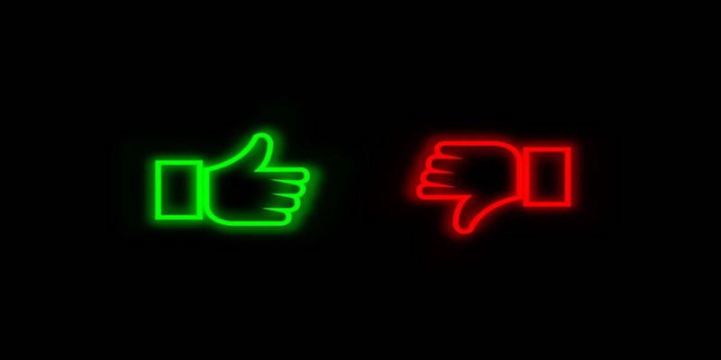 neon thumbs up and down signs