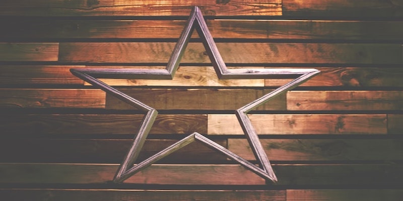 star on wooden background