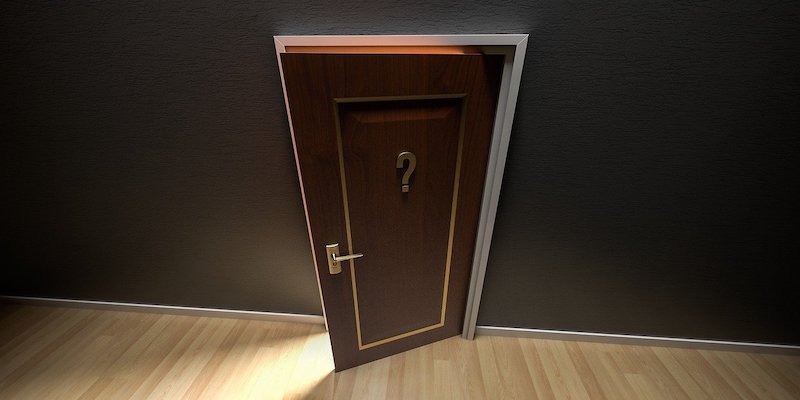 open door with question mark symbol